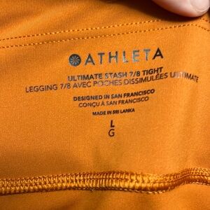 Athleta Ultimate stash 7/8 tight. Size L